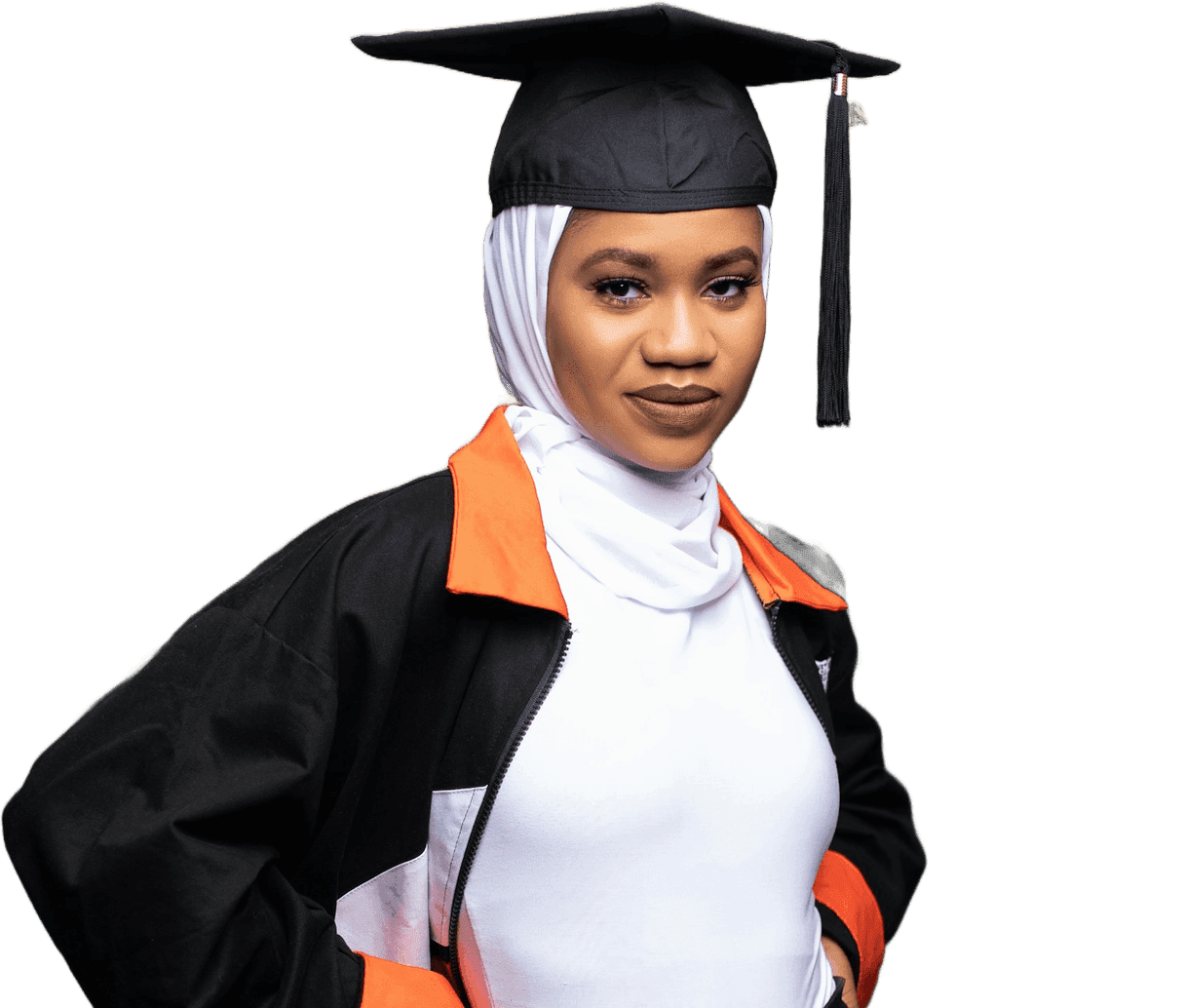 A TIE Fountain graduate in cap and gown